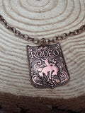 Western Rustic Brass Rodeo Pendant Necklace — 22 Inch Cowgirl Statement